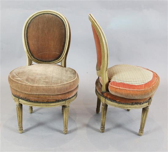 A pair of French cream painted salon chairs H.2ft 8in.
